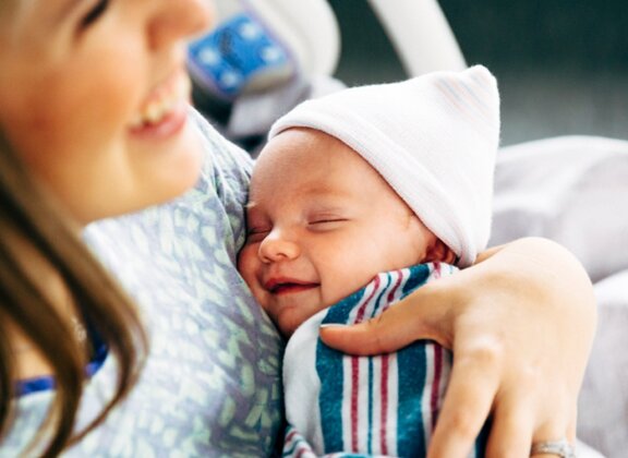 New mom holding baby