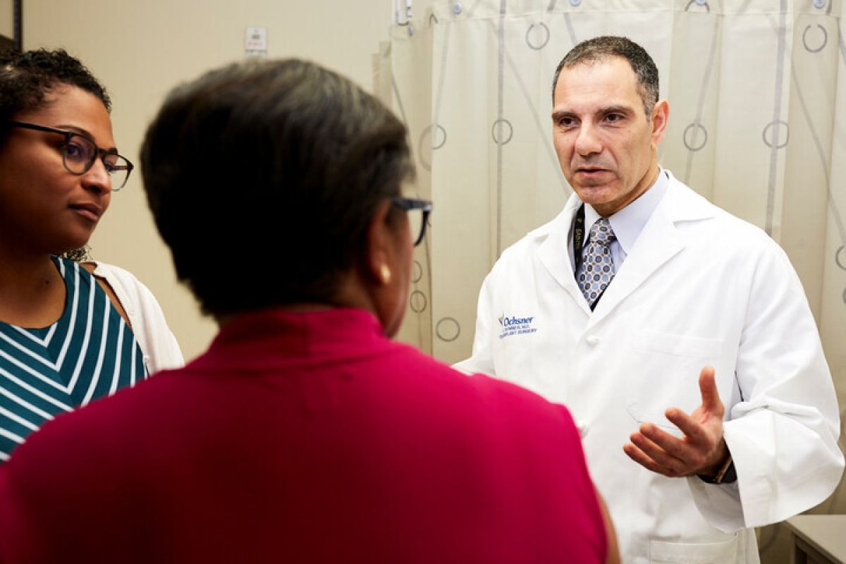 doctor talking with patients family