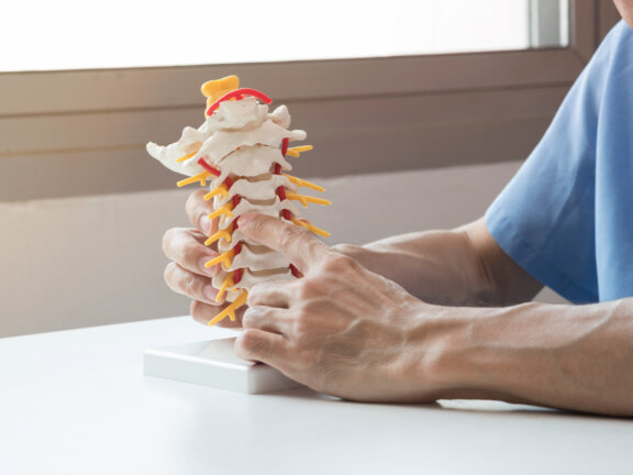 Doctor explaining about spine to the patient