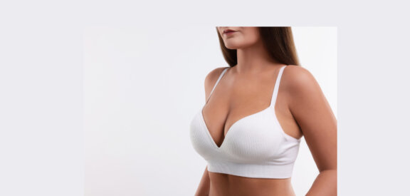 Breast reconstruction patient in white bra
