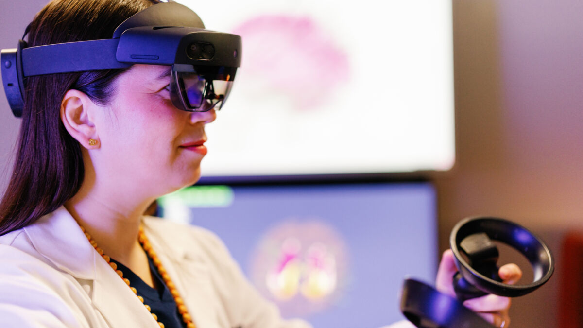 Neuroscience physician Dr Kahn with AI controller