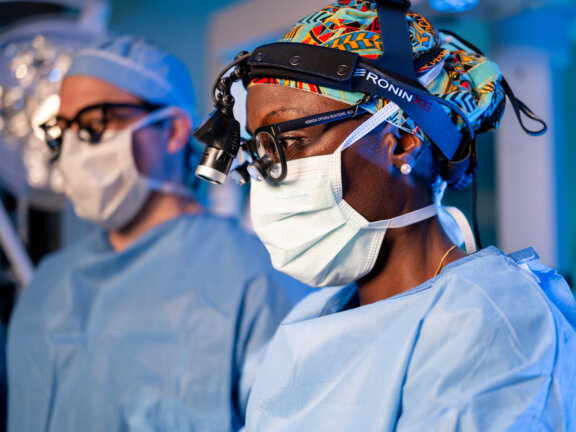 Scott and Opoku Boateng in surgery