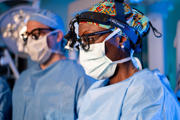 Scott and Opoku Boateng in surgery