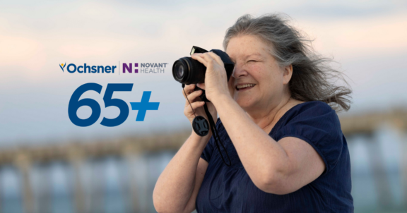 Pensacola web hero woman with camera