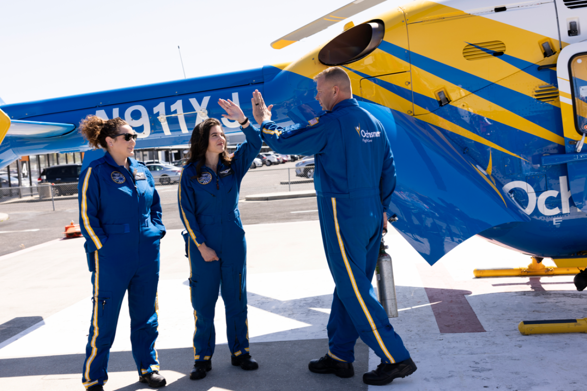 Ochsner Flight Care team in front of helicopter