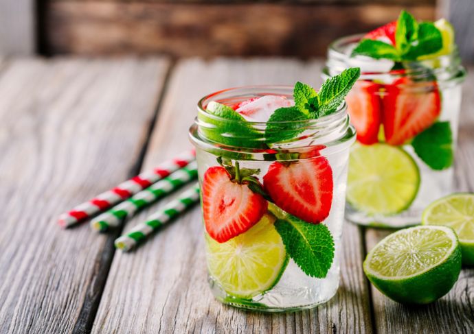 Water infused with strawberries lime and basil
