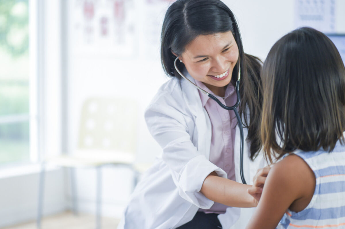 Pediatric emergency doctor treating pediatric patient