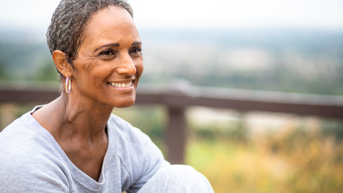 Woman going through menopause smiling