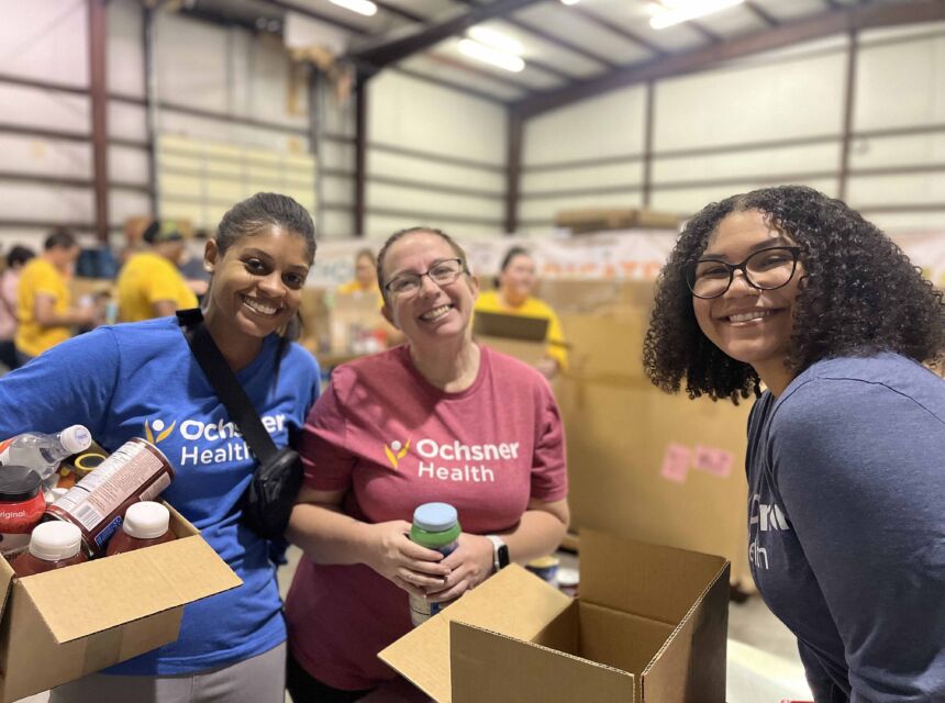 3 Ochsner Health employees volunteering at Second Harvest