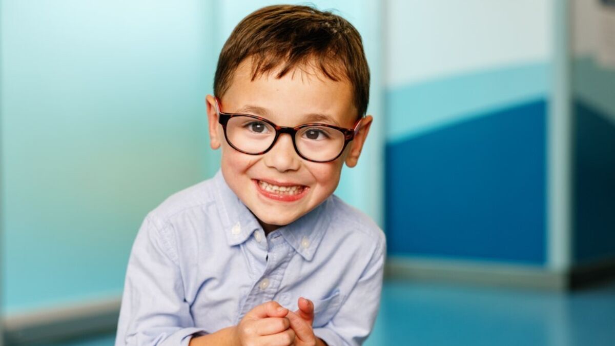 Ochsner pediatrics patient smiling with glasses