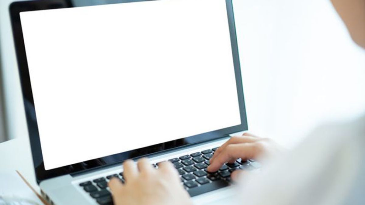 Person taking class online at computer