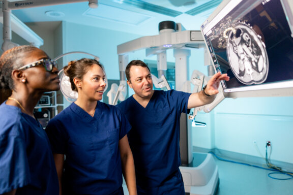 Endocrinology Surgeons Dahle Scott Opoku Boateng looking at xray