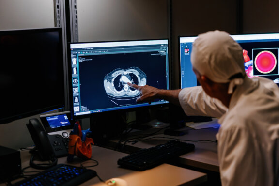 Cardiac surgeon looking at patient scans