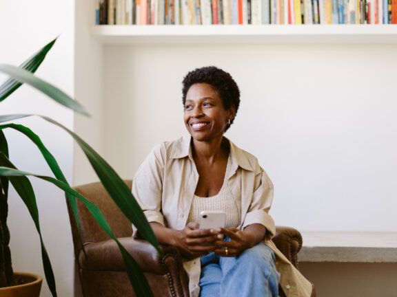 Woman smiling looking to the side