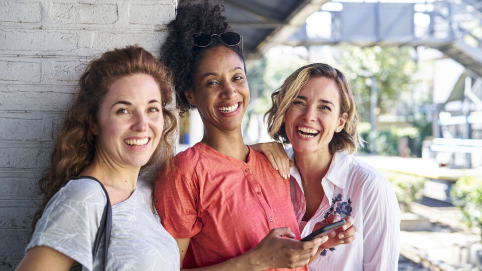 Group of women smiling and laughing